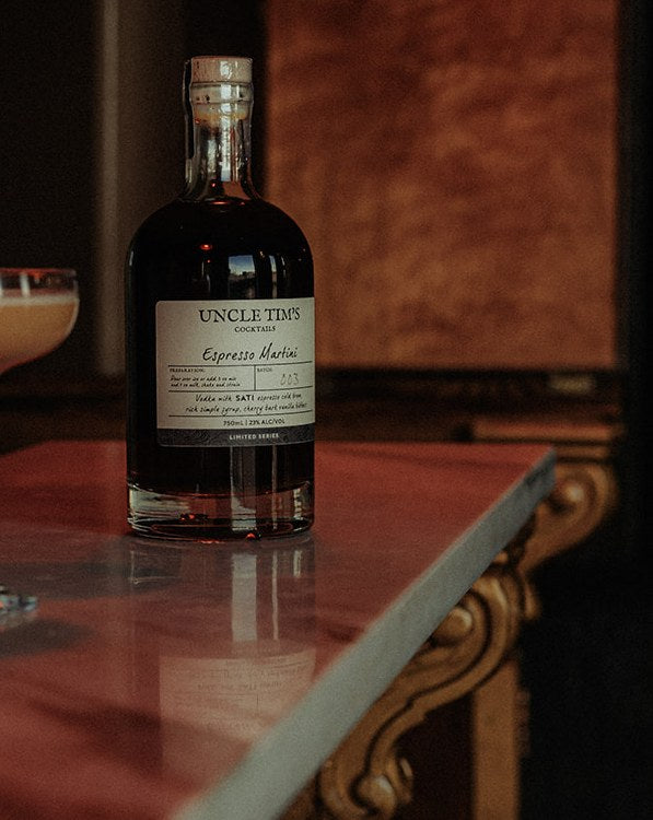 Uncle Tim's Espresso Martini bottle with a prepared Espresso Martini